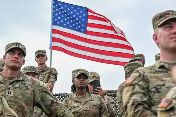 us military with usa flag