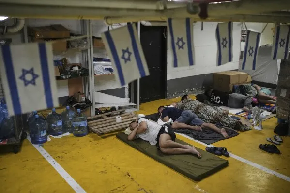 Sirens, Shelters and Skies Aflame: Israelis Flee Homes as Iranian Projectiles Rain Down